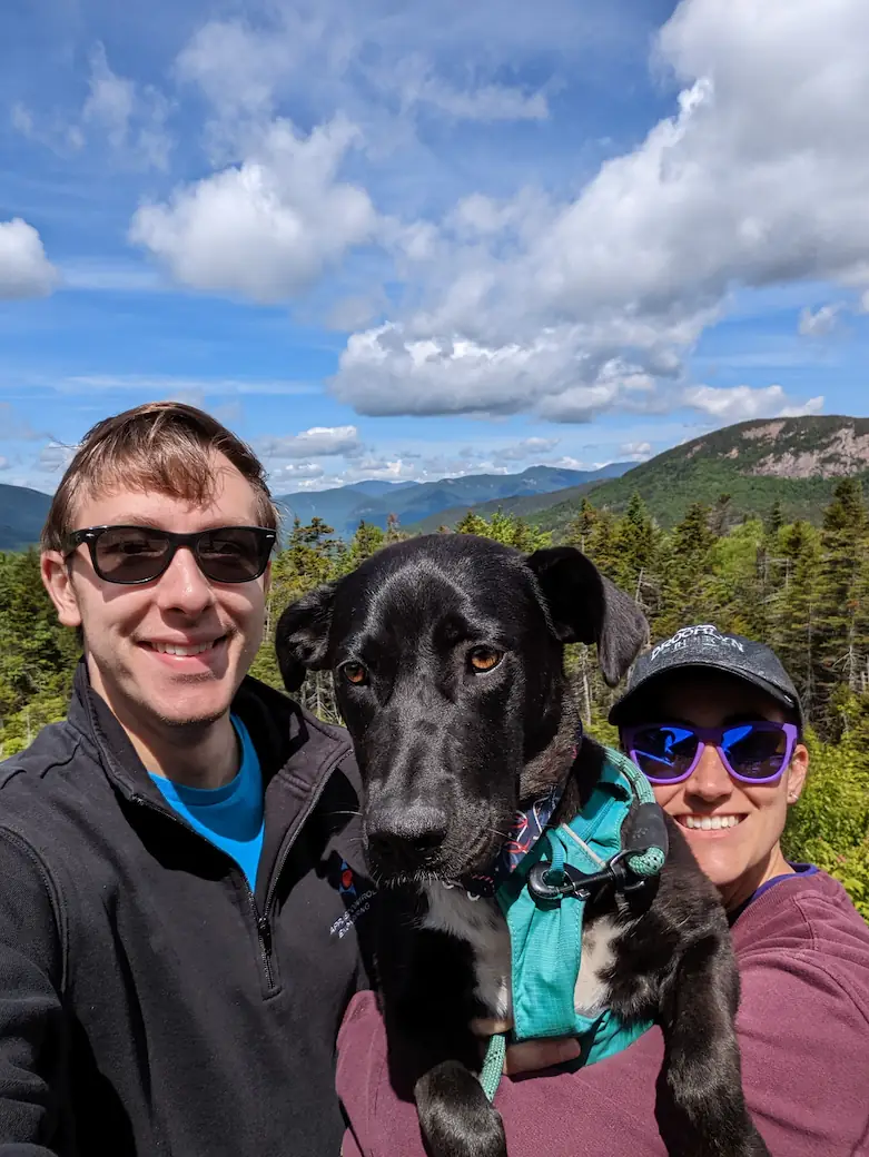 Danielle, Quentin, and Gracie on their first camping adventure in New Hampshire.