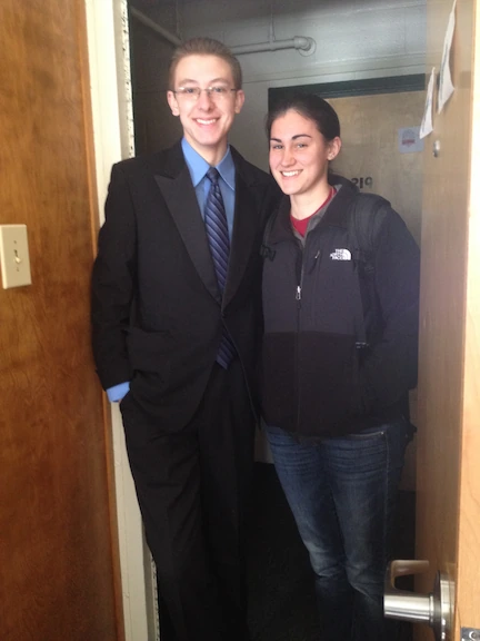 Quentin and Danielle in front of Quentin's dorm room door, freshman year.