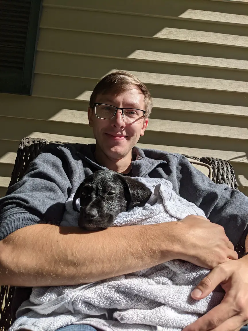 Quentin holding Gracie on adoption day.